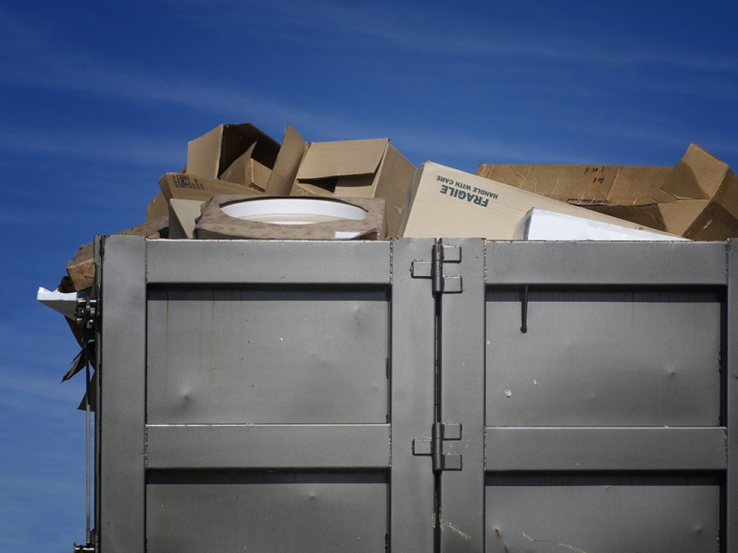 Overflowing Dumpster